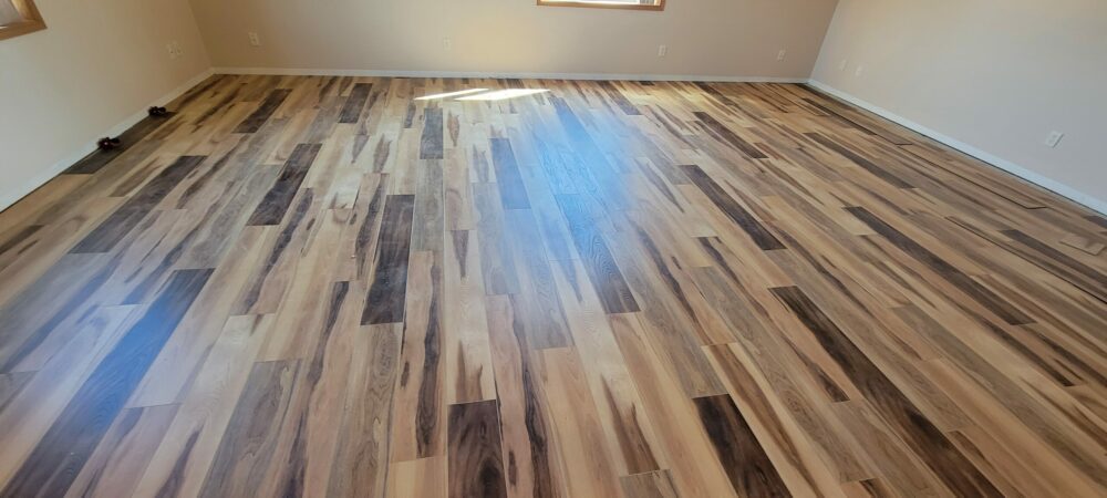 LaValle Flooring Mute Step Huntington Hickory installation in North Dakota living room and dining room