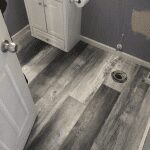 Southwind Authentic Plank Highland Gray in a bathroom
