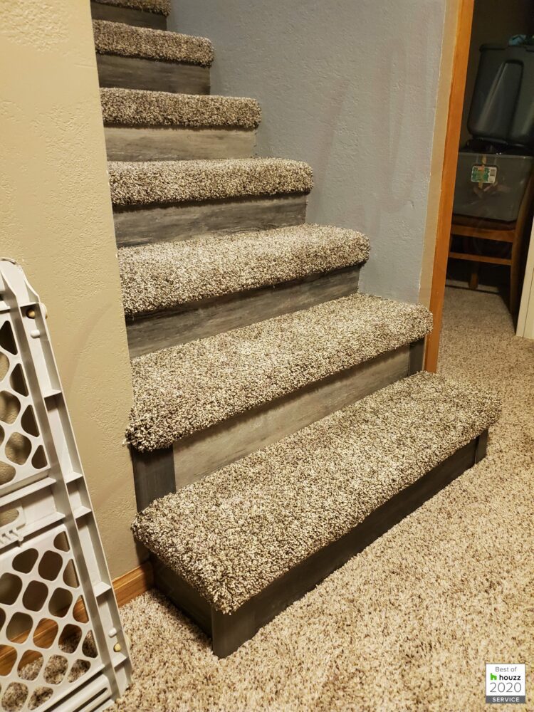 Southwind Authentic Plank Highland Gray on stairs with carpet