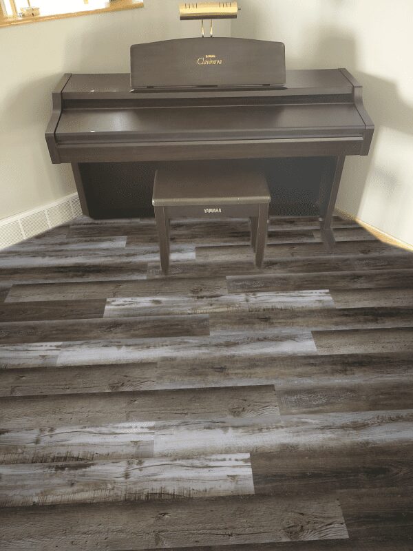 Southwind Colonial Plank Homestead Waterproof Flooring installed around piano