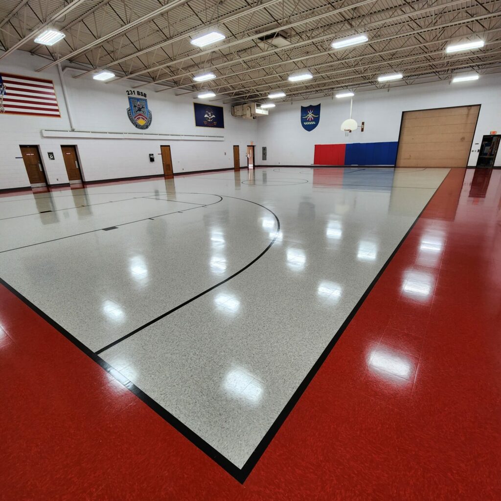 Armstrong Basketball VCT kit in Standard Excelon colors with black feature strips. Service Master came in and applied sealer and wax. VCT install by LaValle Flooring. 