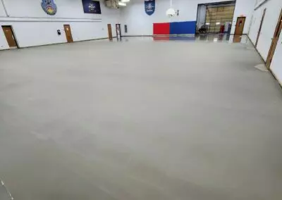 National Guard Armory after having Uzin and Ardex self leveler applied over the top of the old concrete.